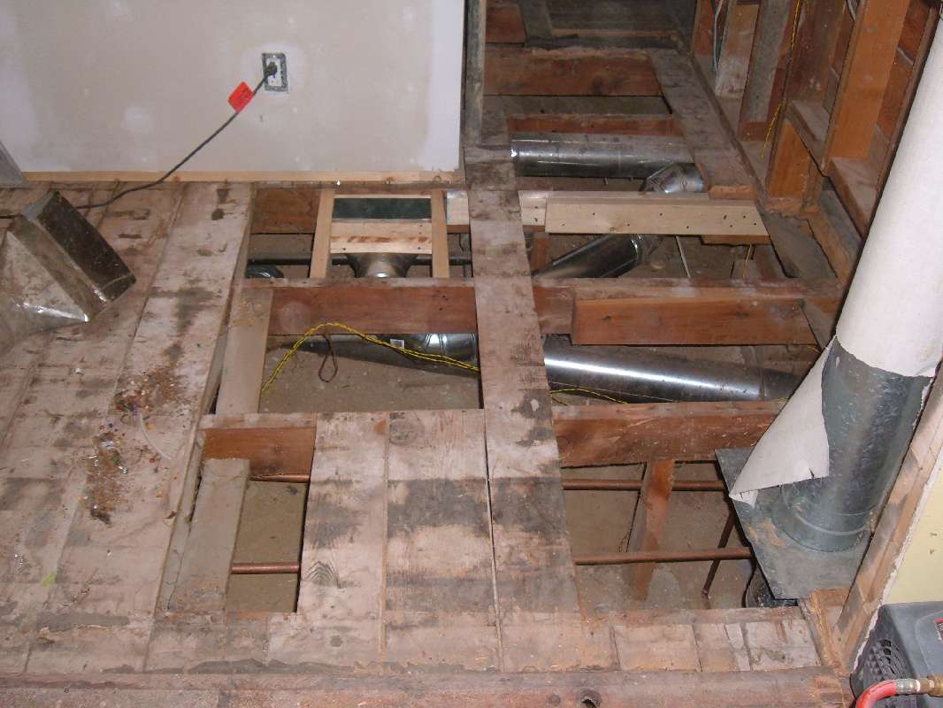 Repairing The Kitchen Floor.